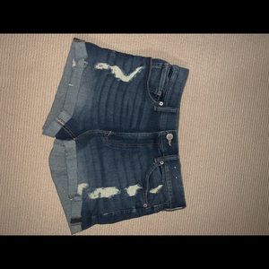 cuffed ripped jean shorts